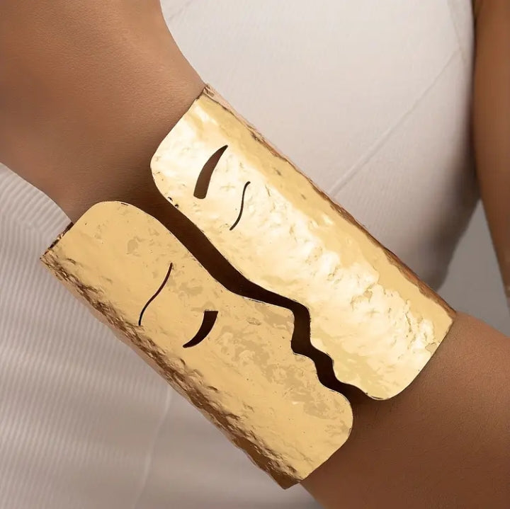 Golden Tone Face Design Luxe Handcuff